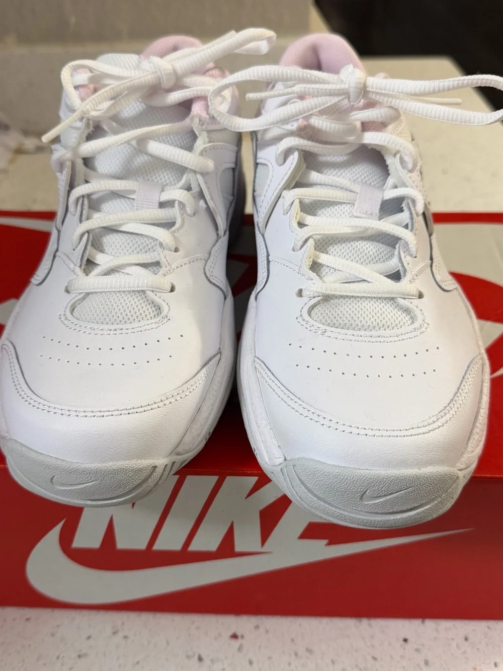 Nike White Sneakers with Light Pink Accents